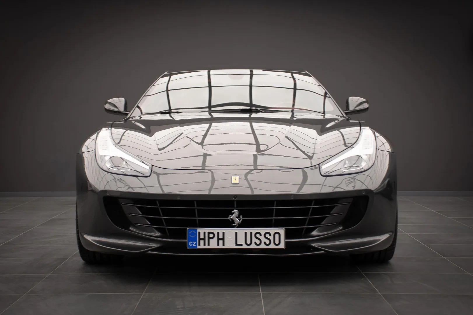 Ferrari GTC4 Lusso V12 front head-on view in TIQOSS showroom