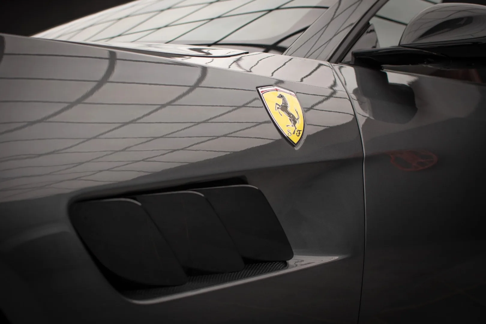 Ferrari GTC4 Lusso V12 Scuderia Ferrari shield and side fender vent close-up