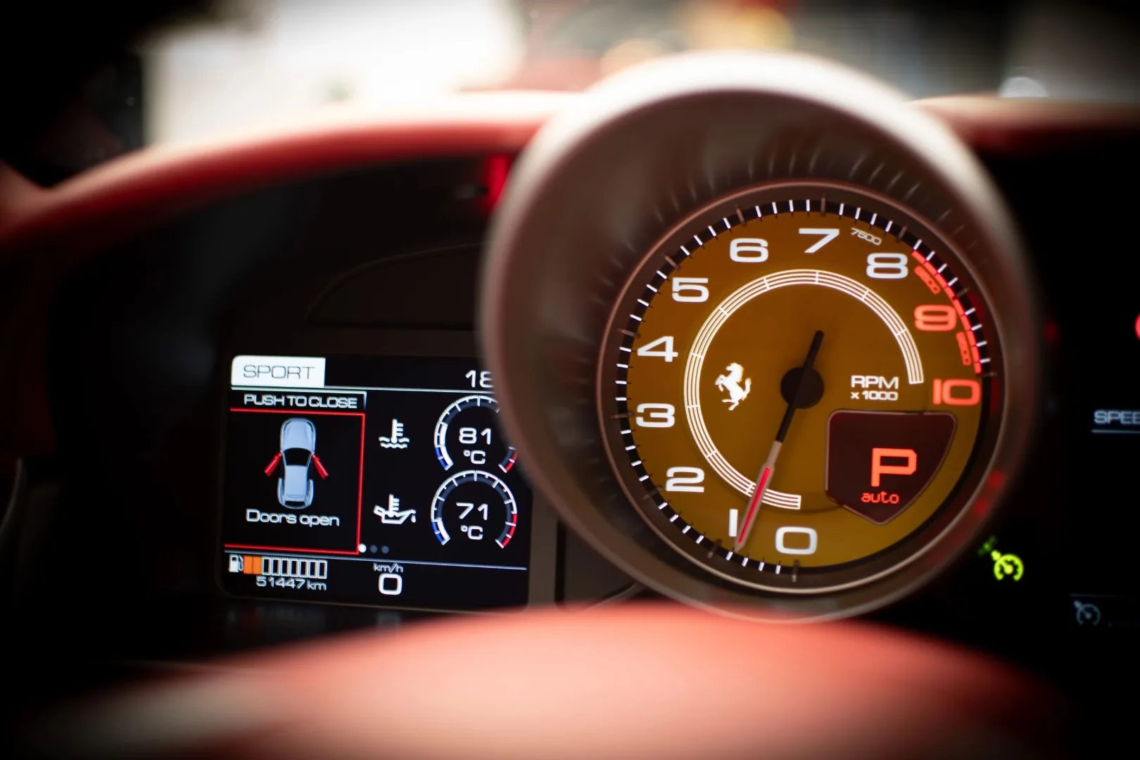 Ferrari GTC4 Lusso V12 tachometer with 10,000 RPM redline and Sport mode display