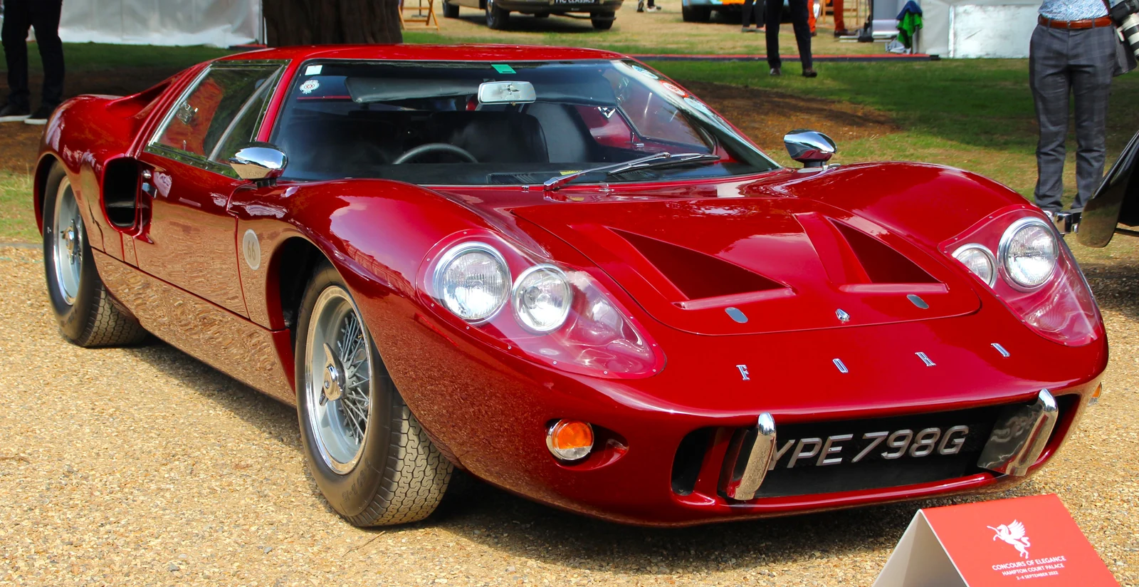 Red 1968 Ford GT40 Mark III road car at Hampton Court Concours, front three-quarter