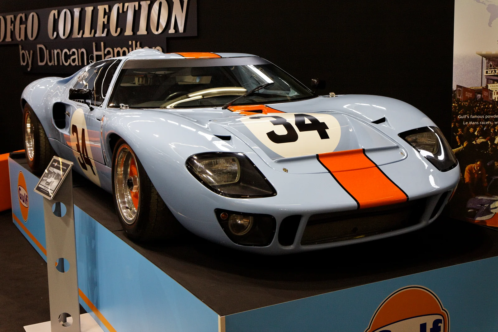 1968 Ford GT40 chassis 1084 on display at Rétromobile, Paris, front three-quarter in Gulf blue and orange