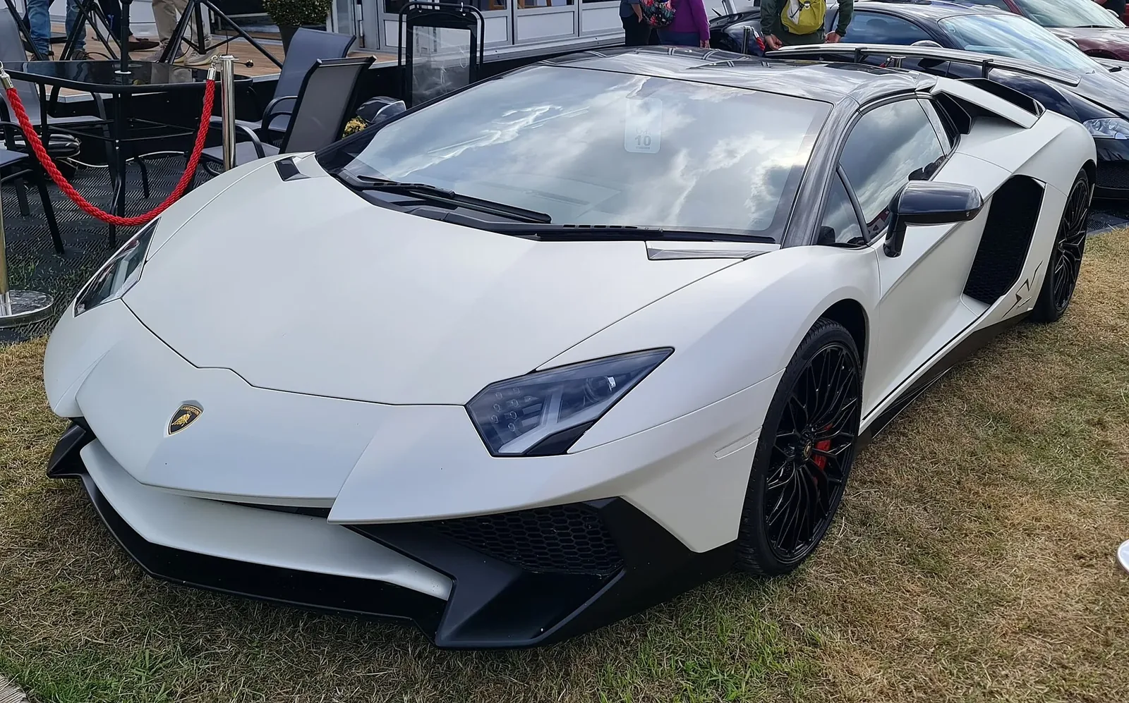 Lamborghini Aventador LP 750-4 SV Roadster in white, side view with the targa roof removed