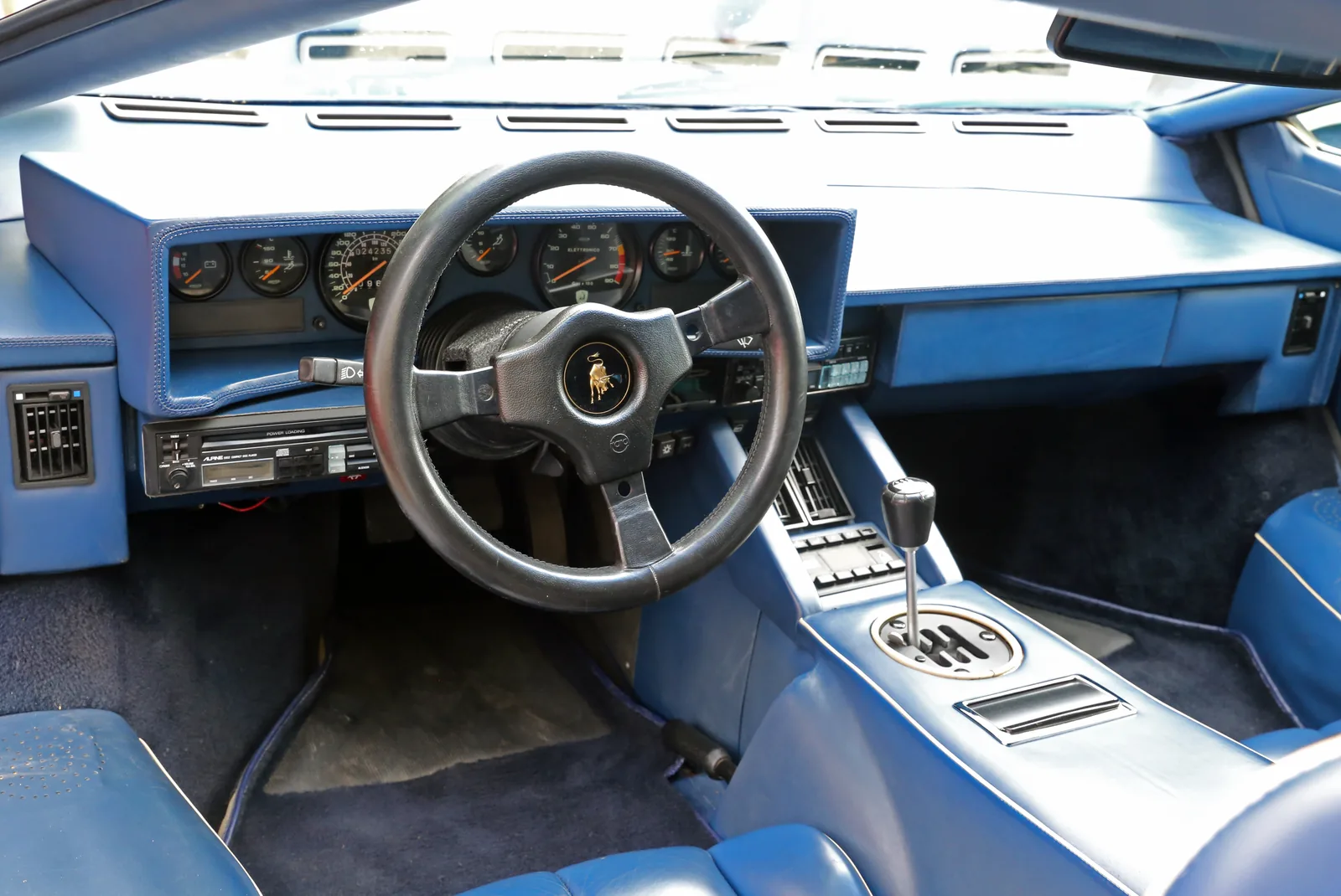 Lamborghini Countach 5000 Quattrovalvole interior with angled dashboard, stacked instruments and a gated five-speed shifter
