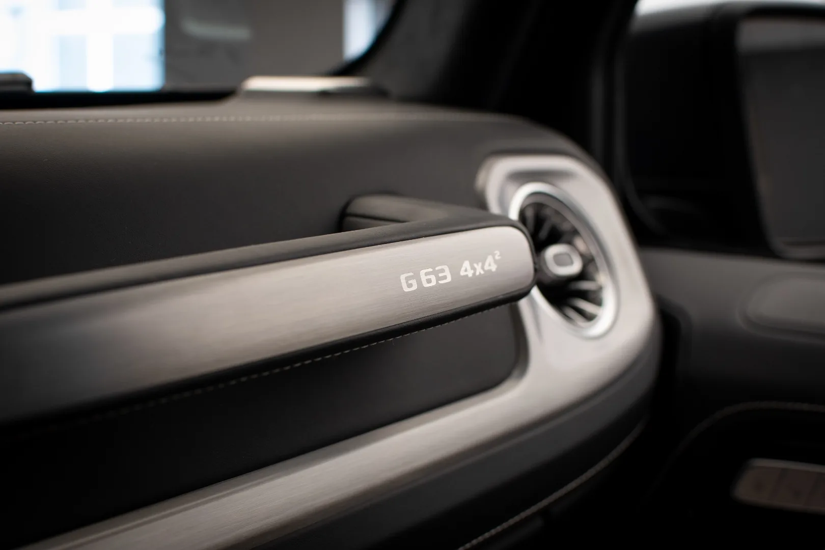 Mercedes-AMG G63 4x4² door panel badge close-up