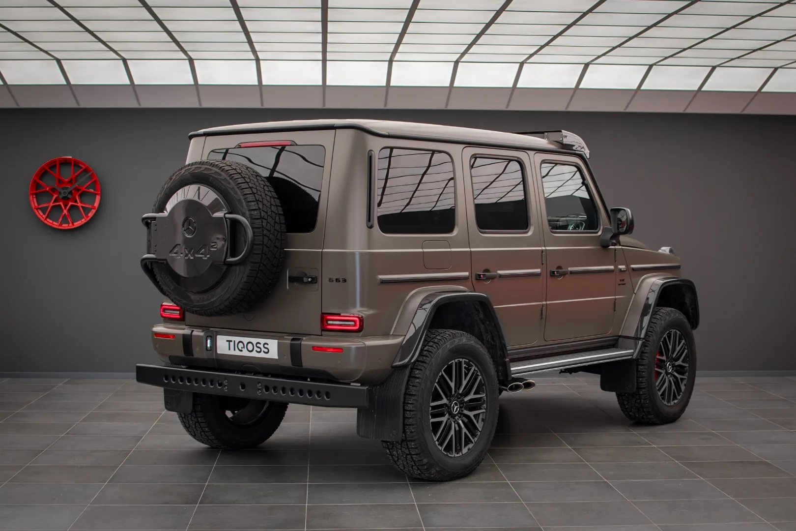 Mercedes-AMG G63 4x4 Squared rear three quarter view with carbon spare wheel cover