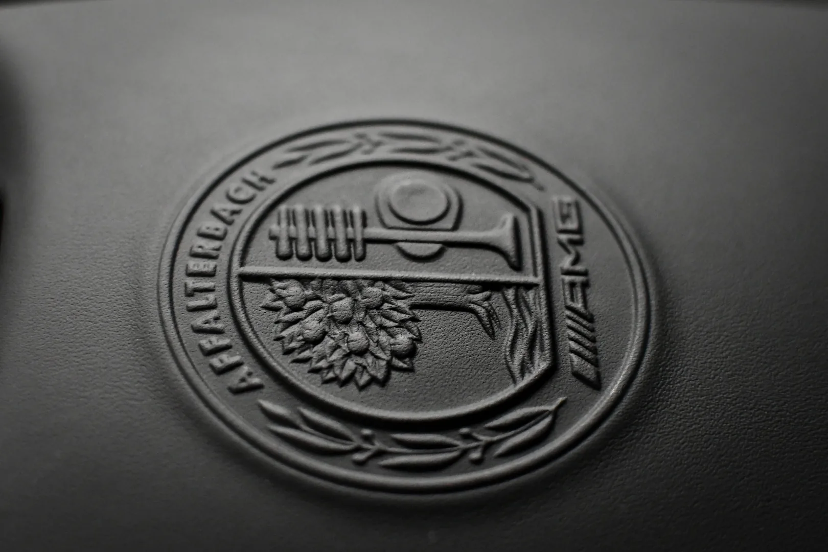 AMG Affalterbach embossed leather crest in GT Black Series interior