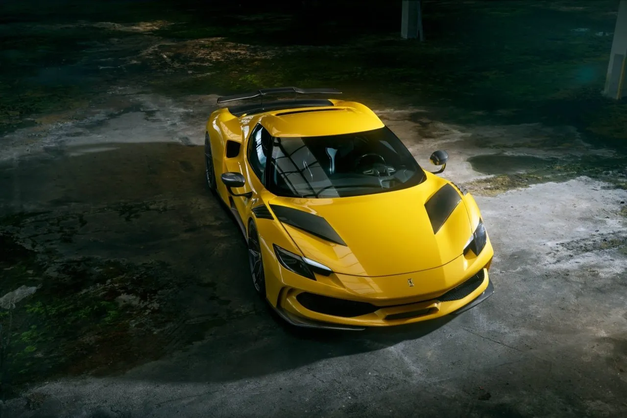 Yellow Novitec Ferrari 296 N-Largo widebody from above on wet concrete