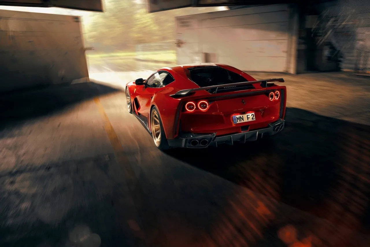 Red Novitec Ferrari 812 N-Largo rear three-quarter view with quad tail lights, rear wing and wide rear arches