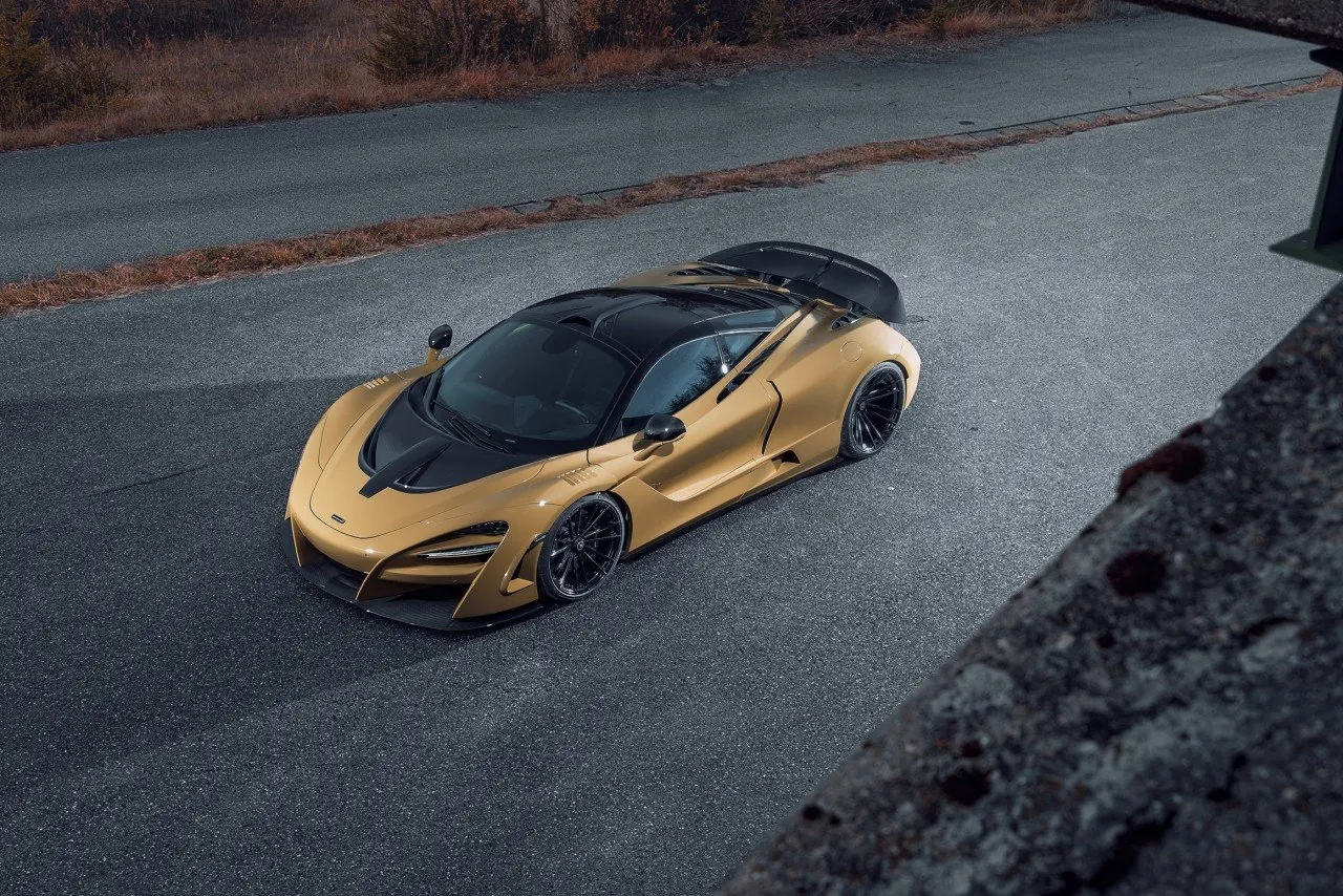 Gold Novitec McLaren 720S N-Largo widebody from above on an empty road