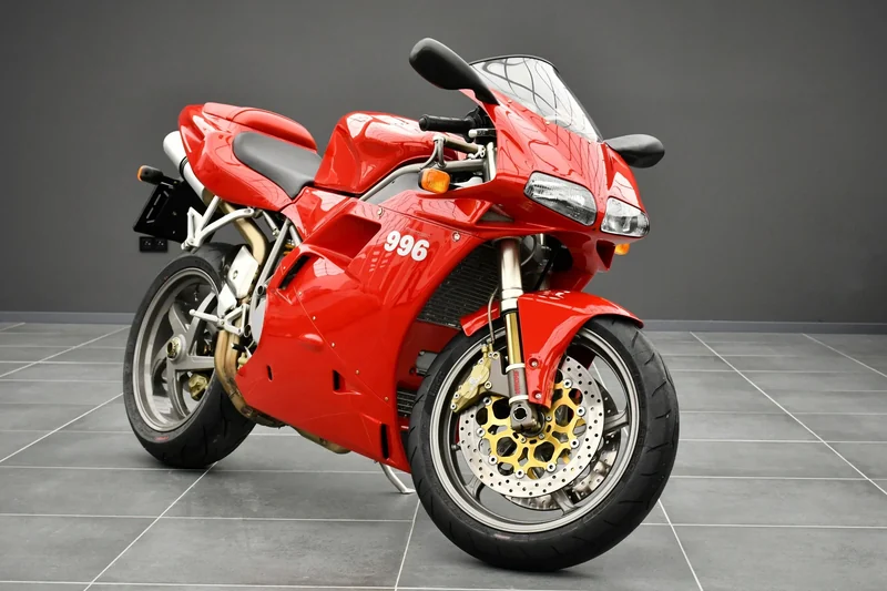 Red 2001 Ducati 996s three-quarter view in the Batman Garage
