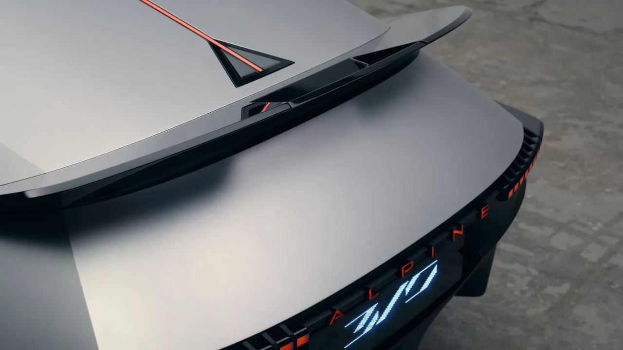 Close-up of the Alpine A310 Vision rear wing, tail-light blades and illuminated 310 logo