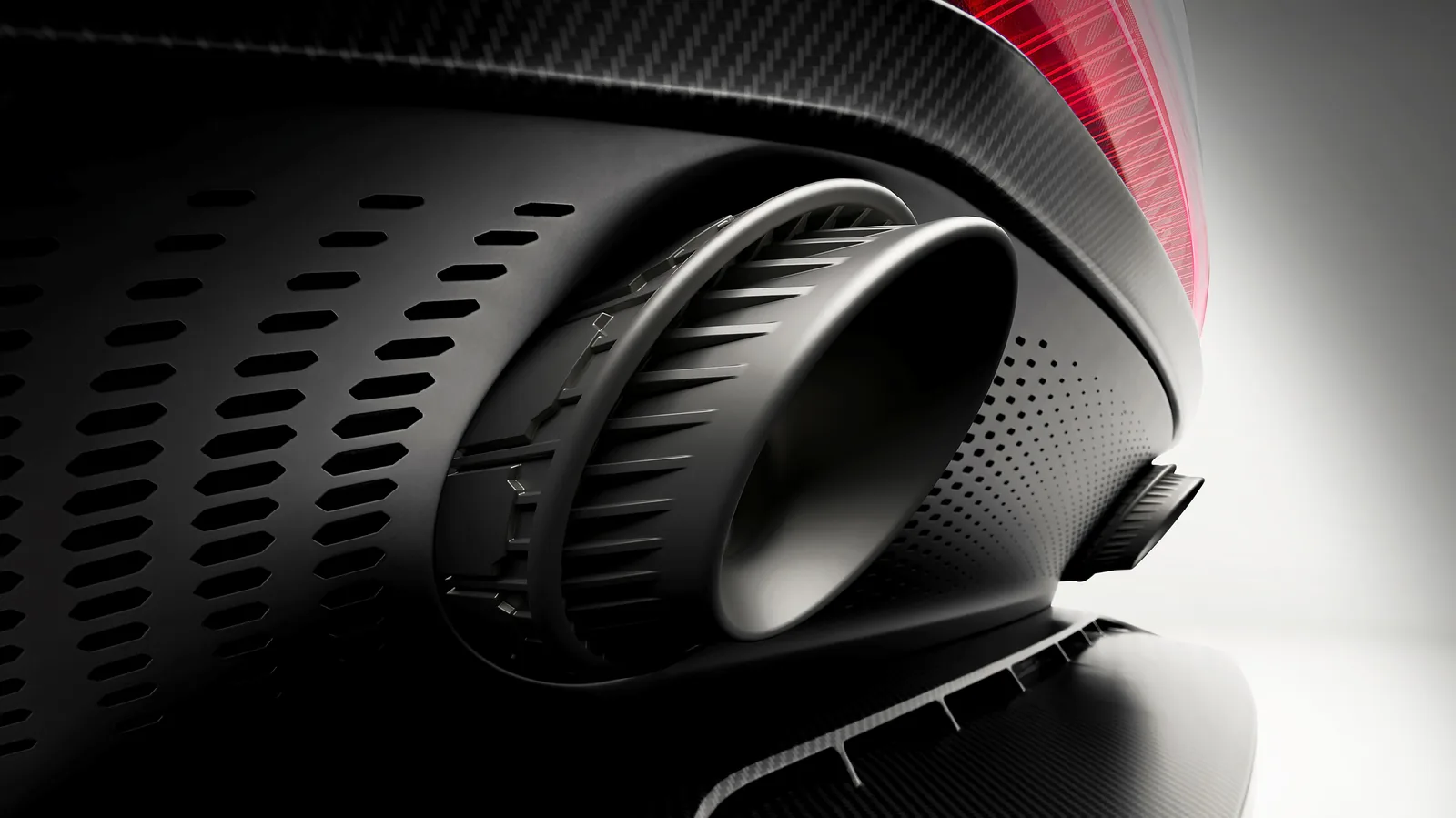 Aston Martin Valen titanium quad exhaust tailpipe with 3D printed micro muffler close-up