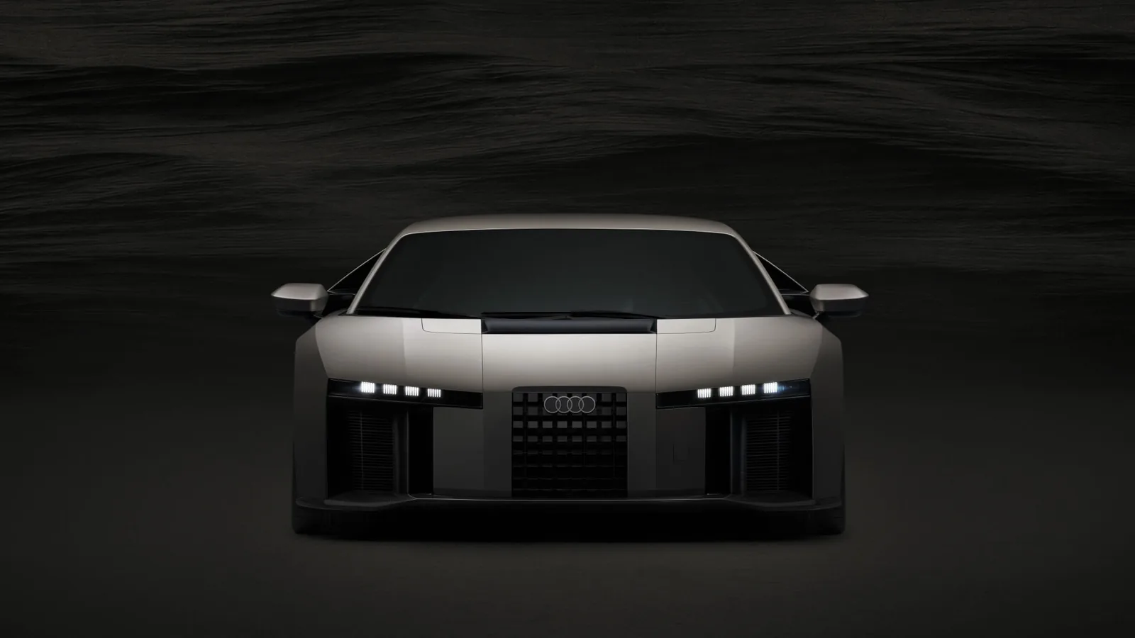 Audi Nuvolari 2027 front head-on — vented S-duct, narrow LED matrix headlights, Titanium colour