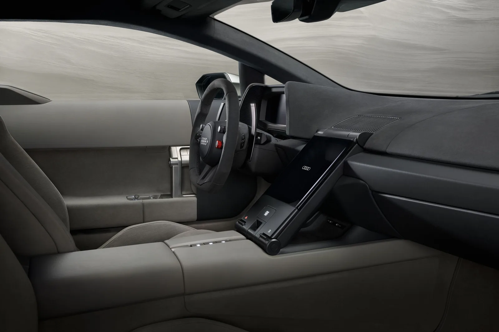 Audi Nuvolari 2027 interior — dashboard, steering wheel with rotary mode dials, two-tone Shadow Dune cabin
