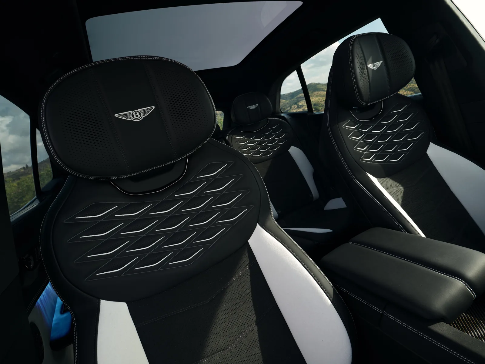 Bentley Torcal cabin with curved OLED display and physical switchgear