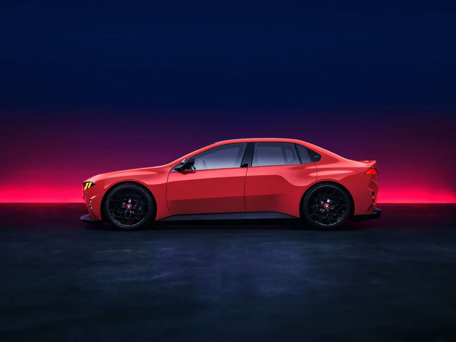 BMW M Concept Neue Klasse side profile in Monza Red with bulging wheel arches