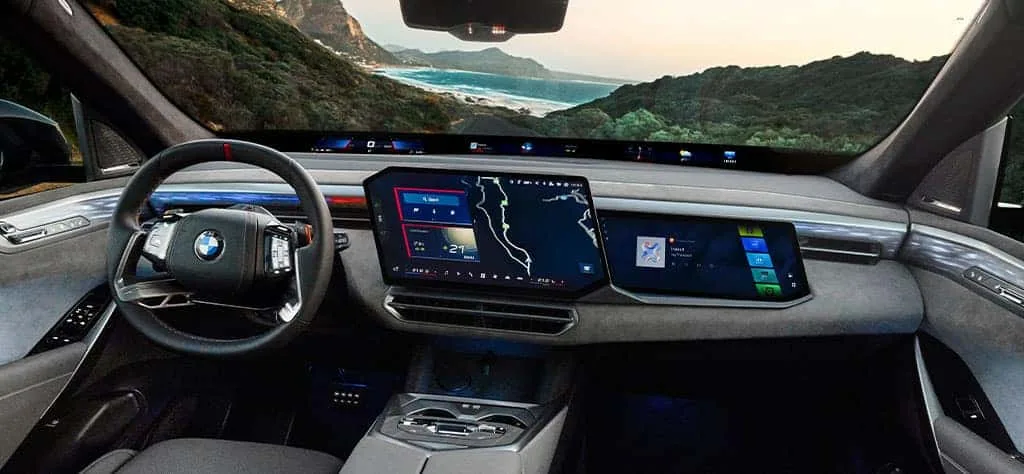 2027 BMW X5 interior — new iDrive X architecture with 17.9-inch central touchscreen, Panoramic Vision windshield projection and optional 14.6-inch passenger screen