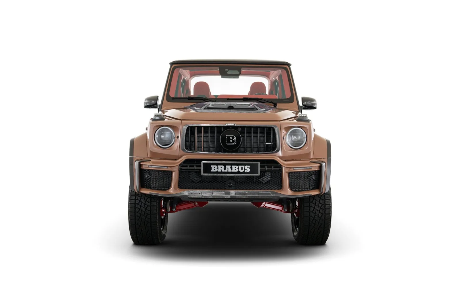 Brabus 800 Cabrio rear three-quarter studio detail with carbon-fiber tailgate, integrated rear roll bar and side-exit quad exhaust with red LED illumination