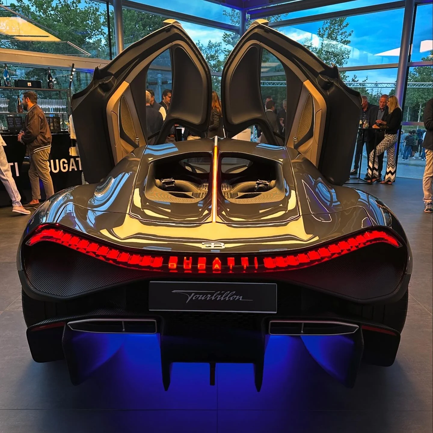 Bugatti Tourbillon analog dashboard and interior with watchmaking instruments