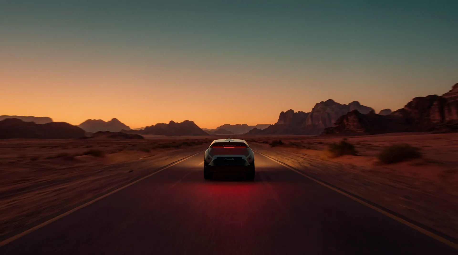 CEER Exobot driving away on a desert highway at sunset, rear light bar illuminated