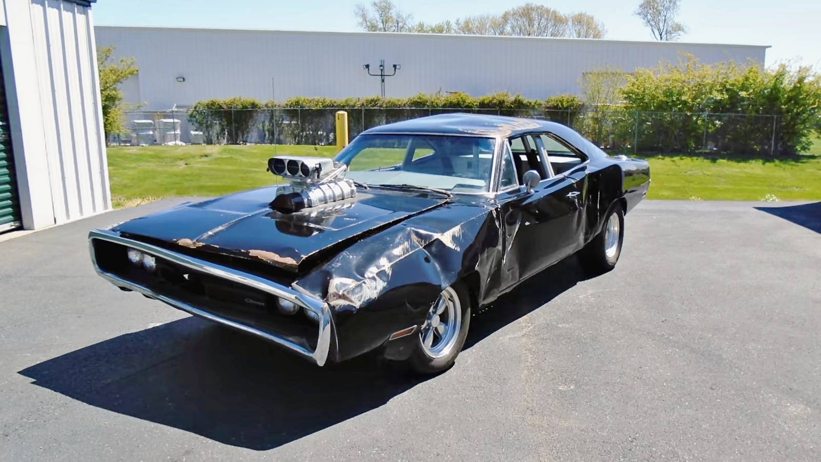Black 1970 Dodge Charger R/T styled as Dominic Toretto’s movie car in front three-quarter view