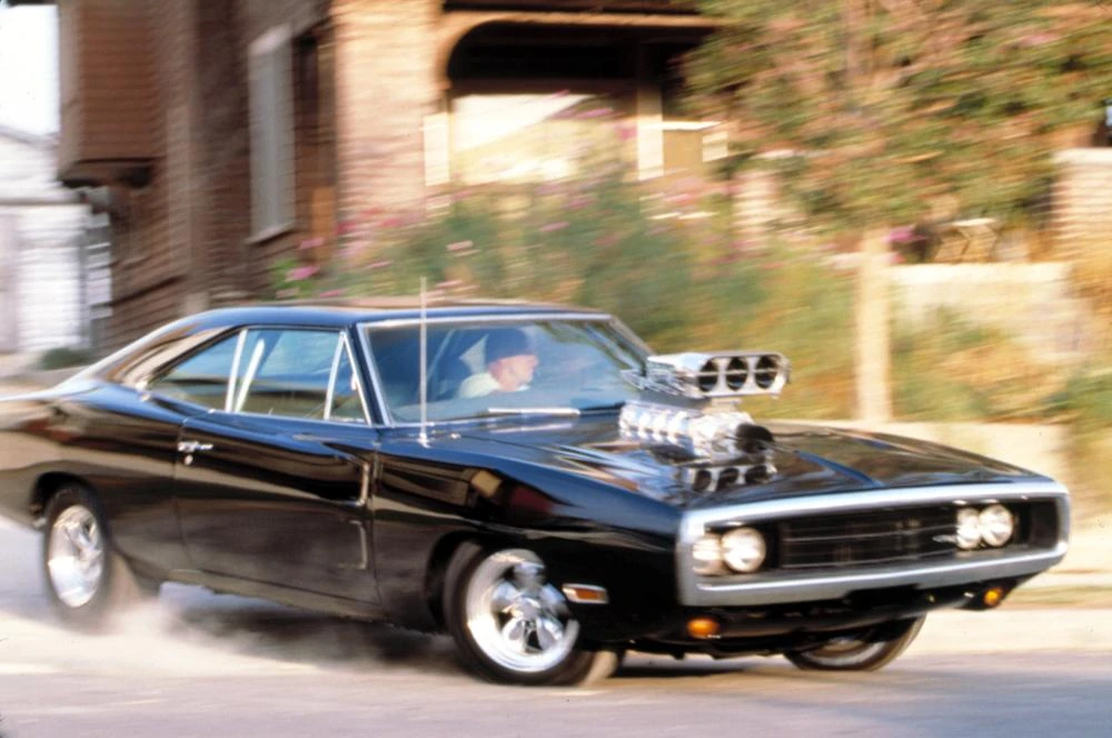 Side profile of a black 1970 Dodge Charger R/T movie-car recreation