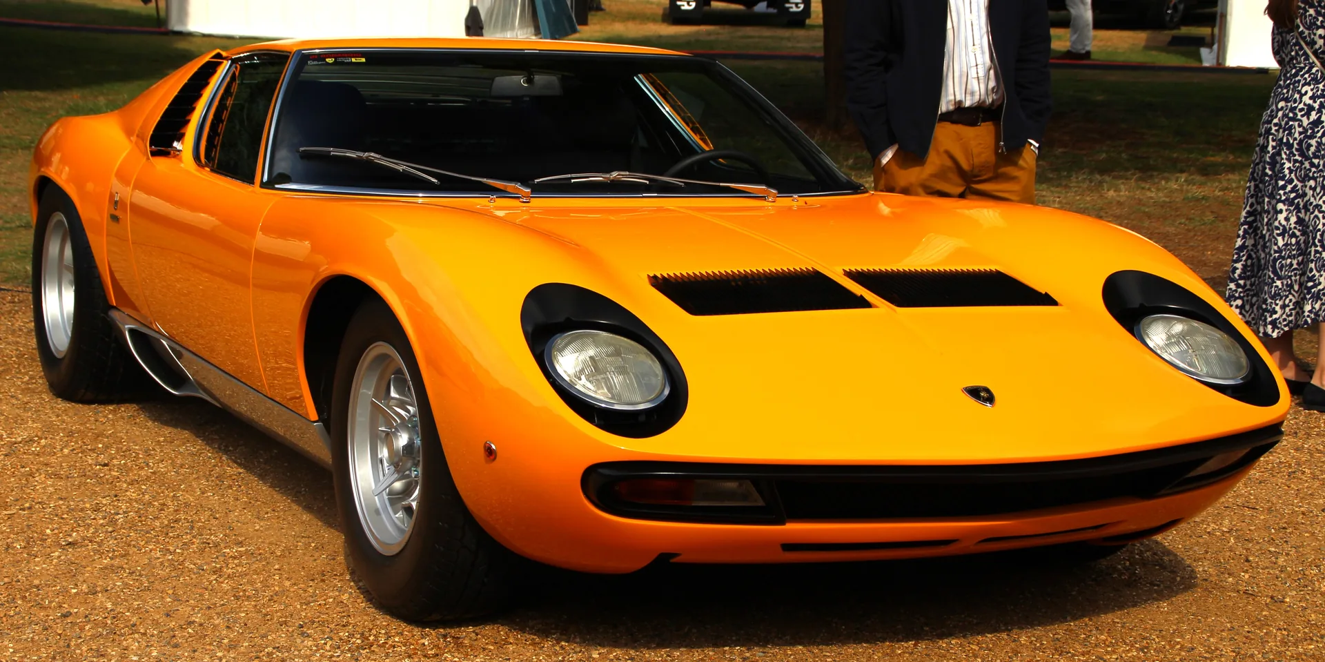 Lamborghini Miura P400 SV in orange, front three-quarter view &mdash; the first Super Veloce and the start of the SV lineage