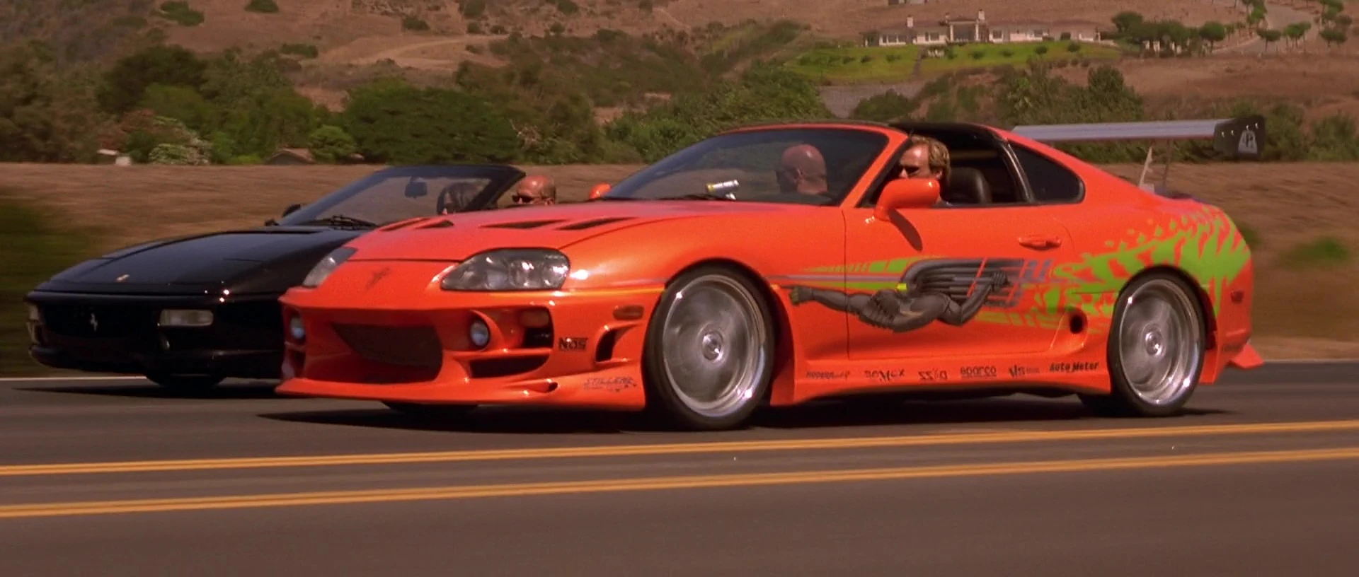 Brian O’Conner’s orange Toyota Supra in a scene from The Fast and the Furious
