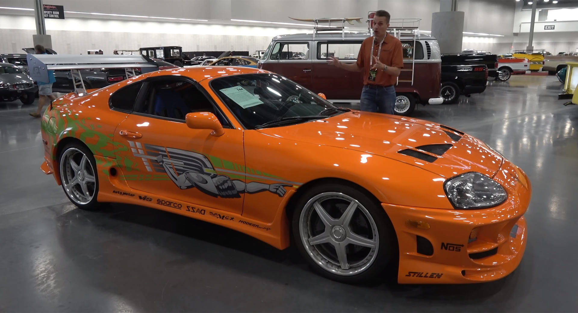 Orange Fast and Furious Toyota Supra viewed from the front three-quarter angle