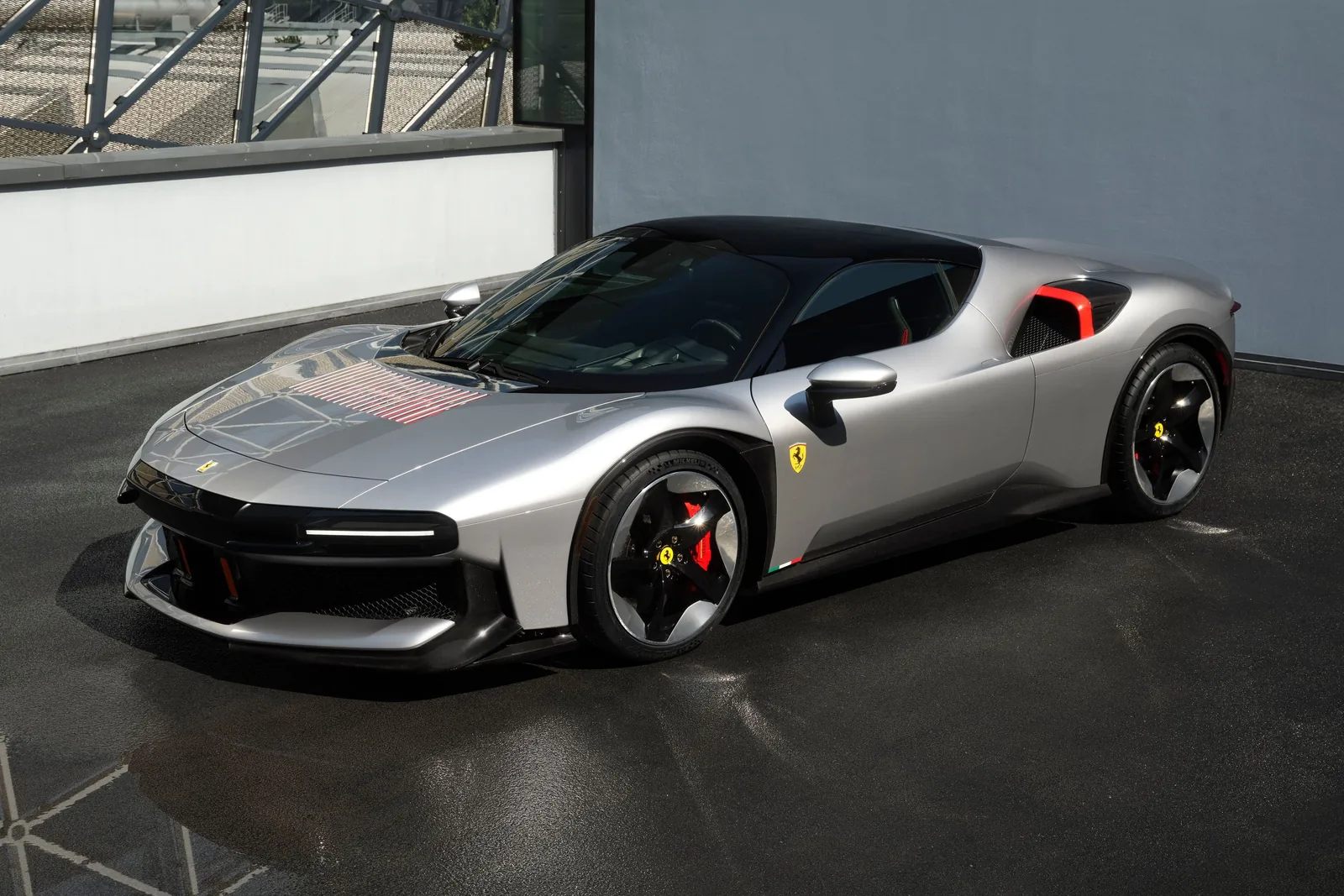 Ferrari CZ26 front three-quarter view with flat 1970s-inspired surfacing and vertical front leading edge