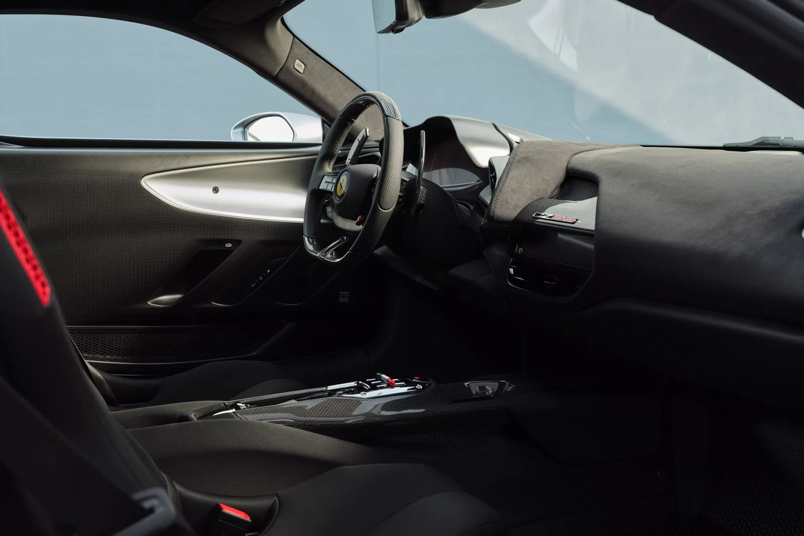 Ferrari CZ26 interior cockpit with black technical fabric dashboard, body-colour Argento Veloce trim and SF90 digital display