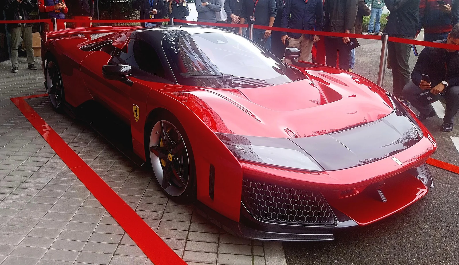 Ferrari F80 in Rosso on display at Maranello in front of Centro Stile