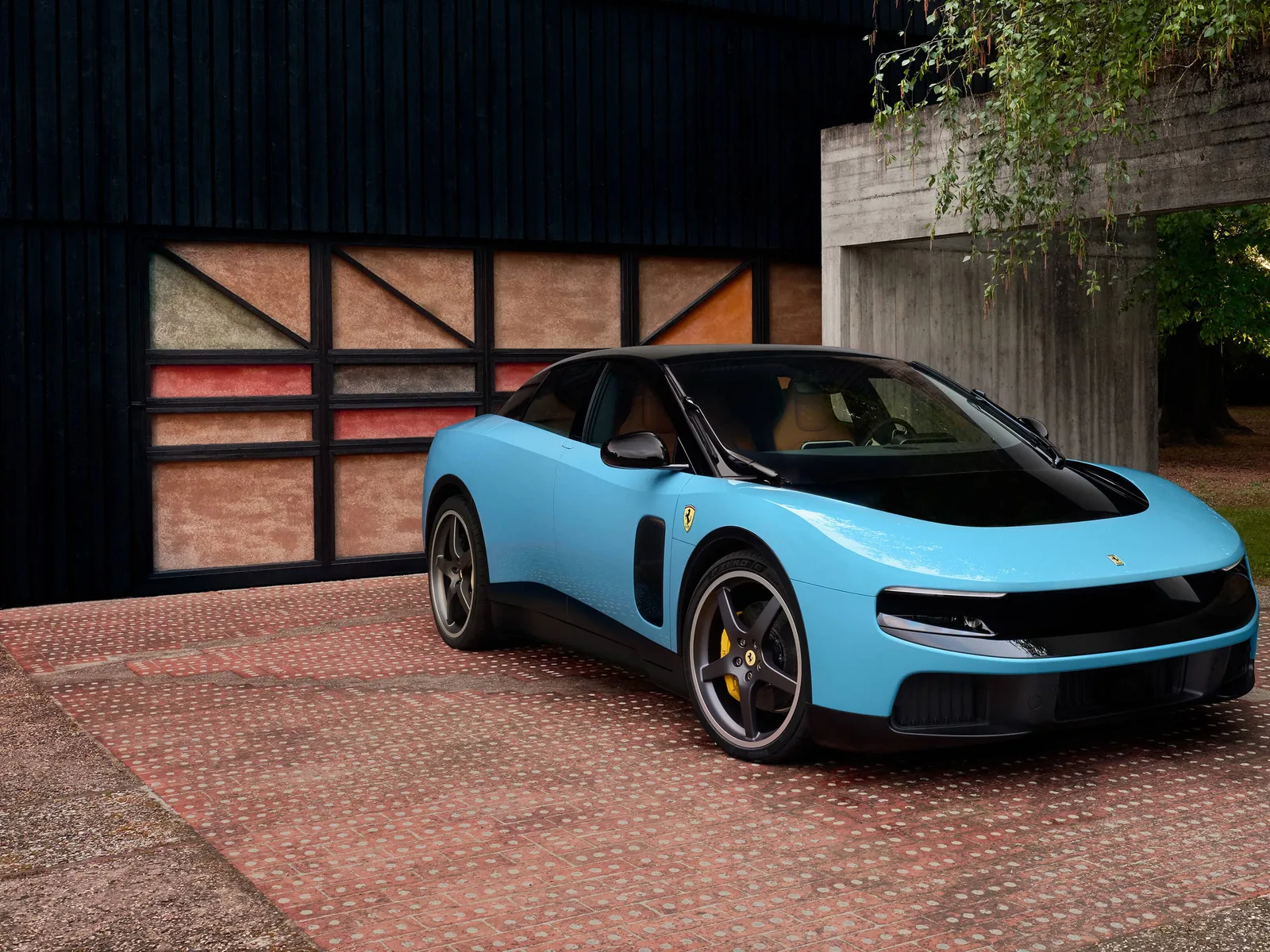 Ferrari Luce side profile in light blue paint showing the long horizontal beltline, tall five-seat greenhouse and clean LoveFrom design that breaks from traditional Ferrari supercar proportions