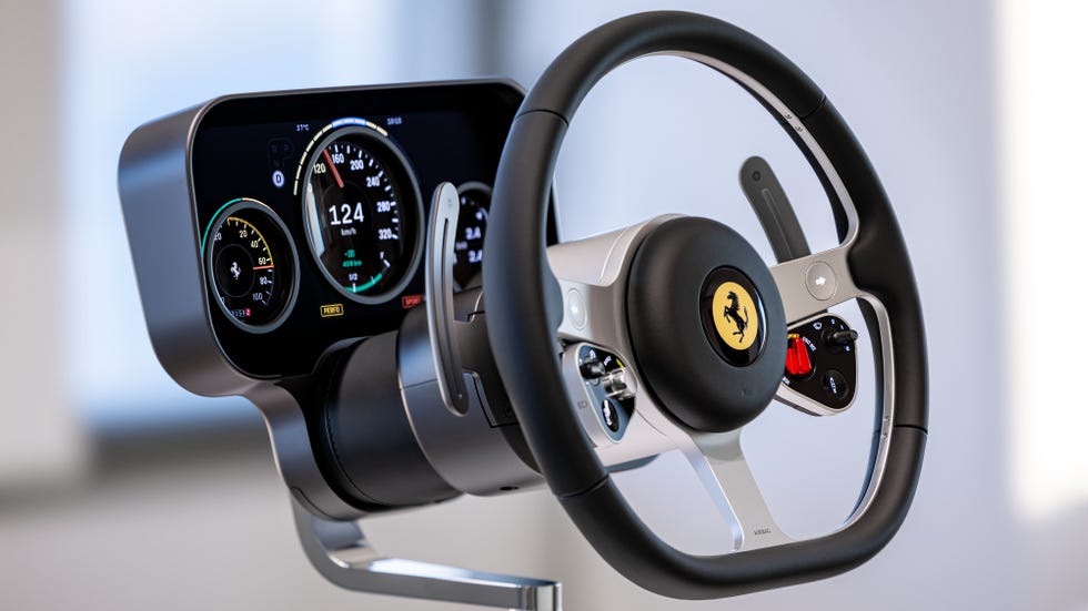 Ferrari Luce steering wheel assembly — CNC-machined recycled aluminium with Manettino and eManettino dials