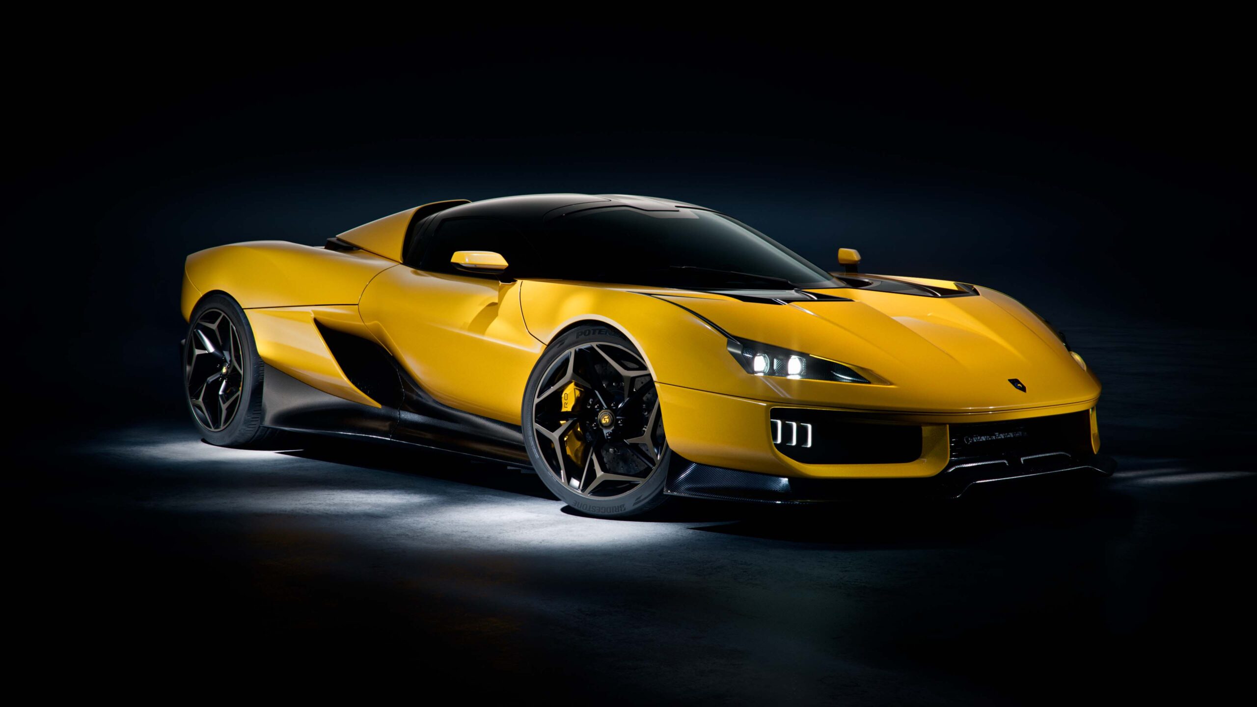 Giamaro Krafla hypercar in yellow — front three-quarter studio shot