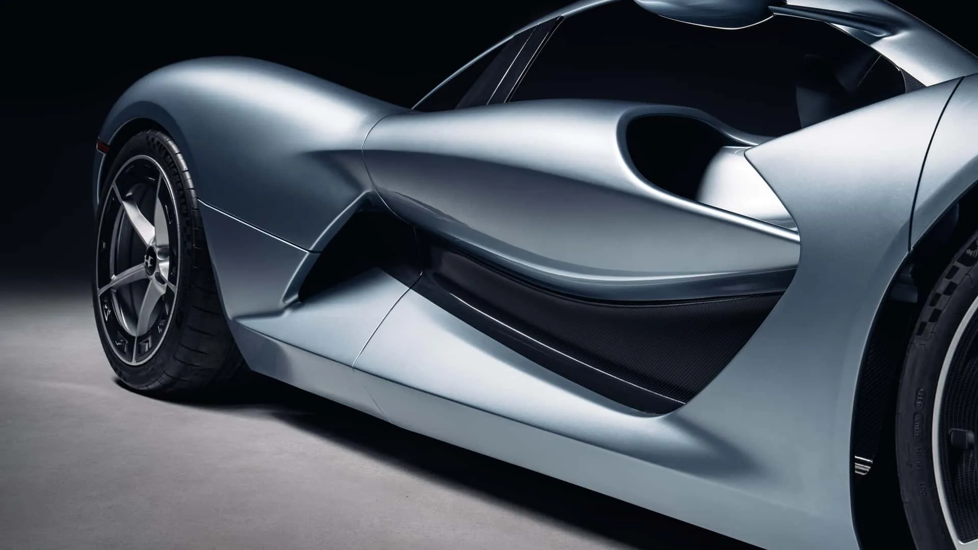 Hennessey Blackbird steering wheel and five analog dials &mdash; central 10,000 rpm tachometer, Hennessey 'H' badge, zero screens