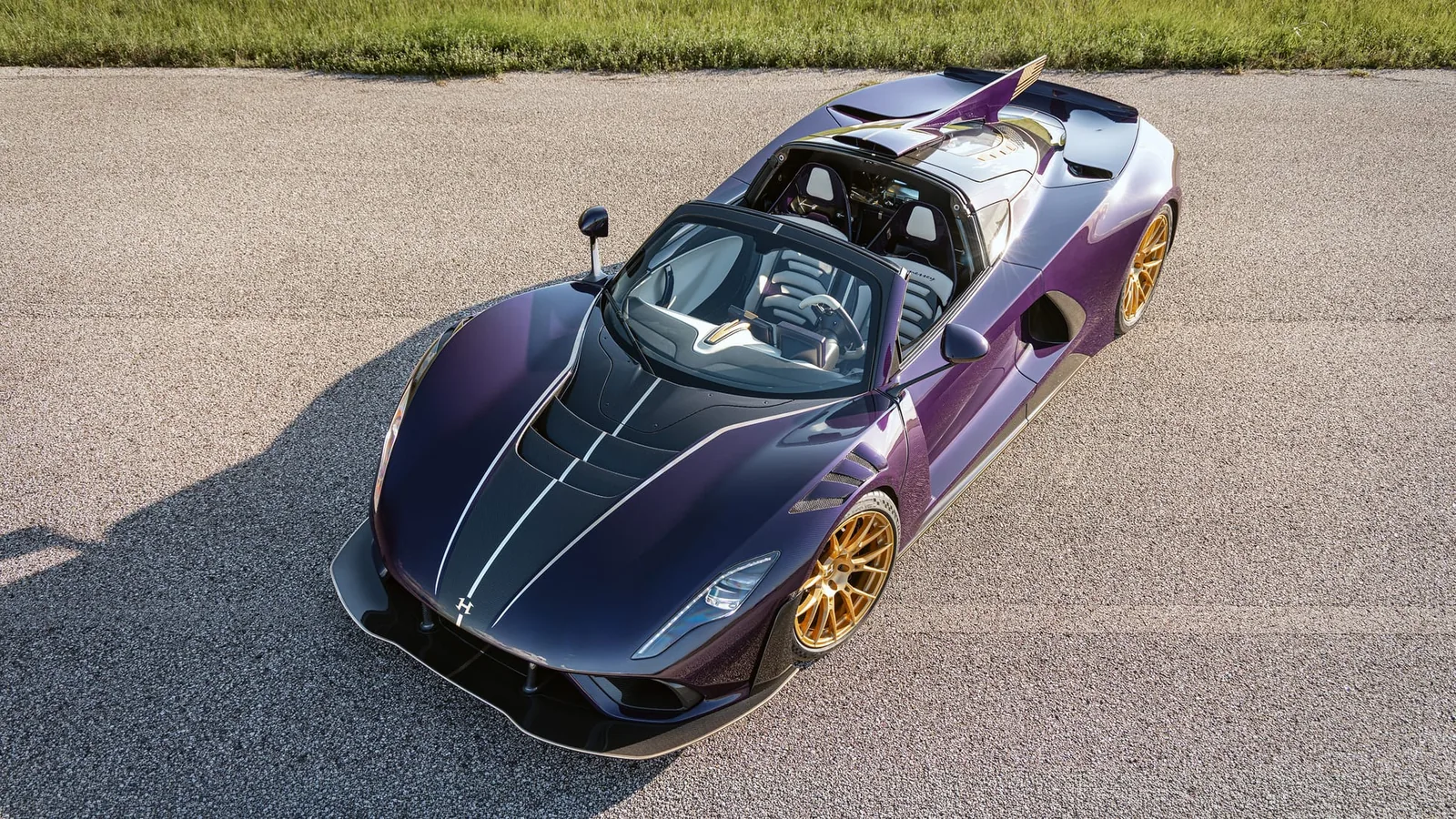 Hennessey Venom F5-M Roadster head-on front — carbon fibre body, integrated roof scoop feeding the 6.6L twin-turbo Fury V8