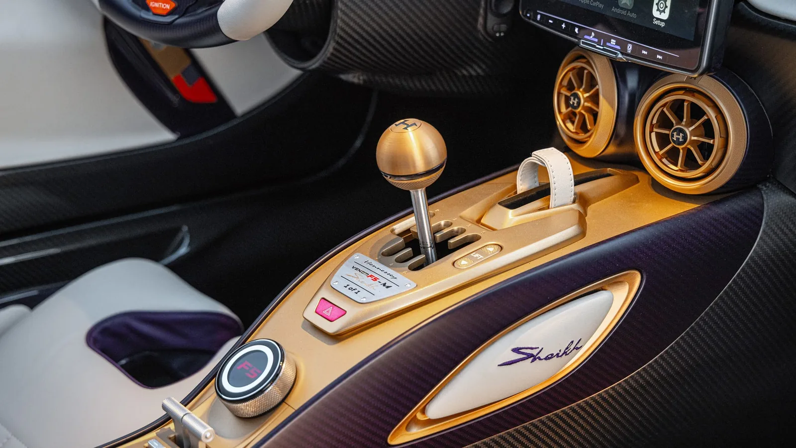 Hennessey Venom F5-M interior close-up — machined aluminium gated shifter for the six-speed mechanical manual gearbox with three-pedal layout