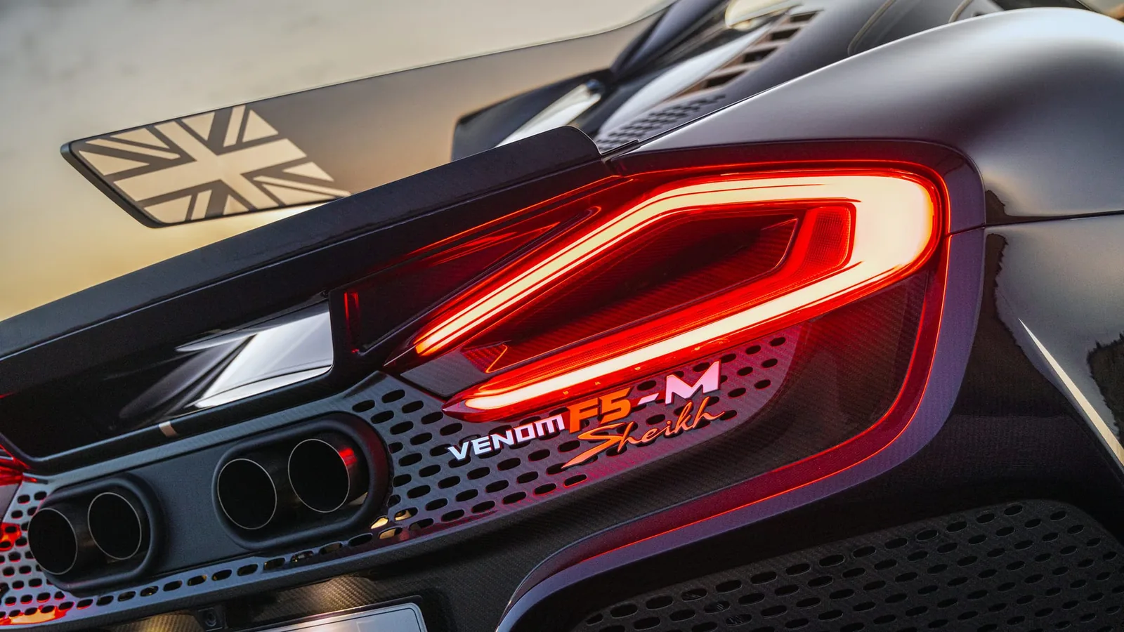 Hennessey Venom F5-M brake light and rear haunch detail — carbon fibre construction with integrated LED signature