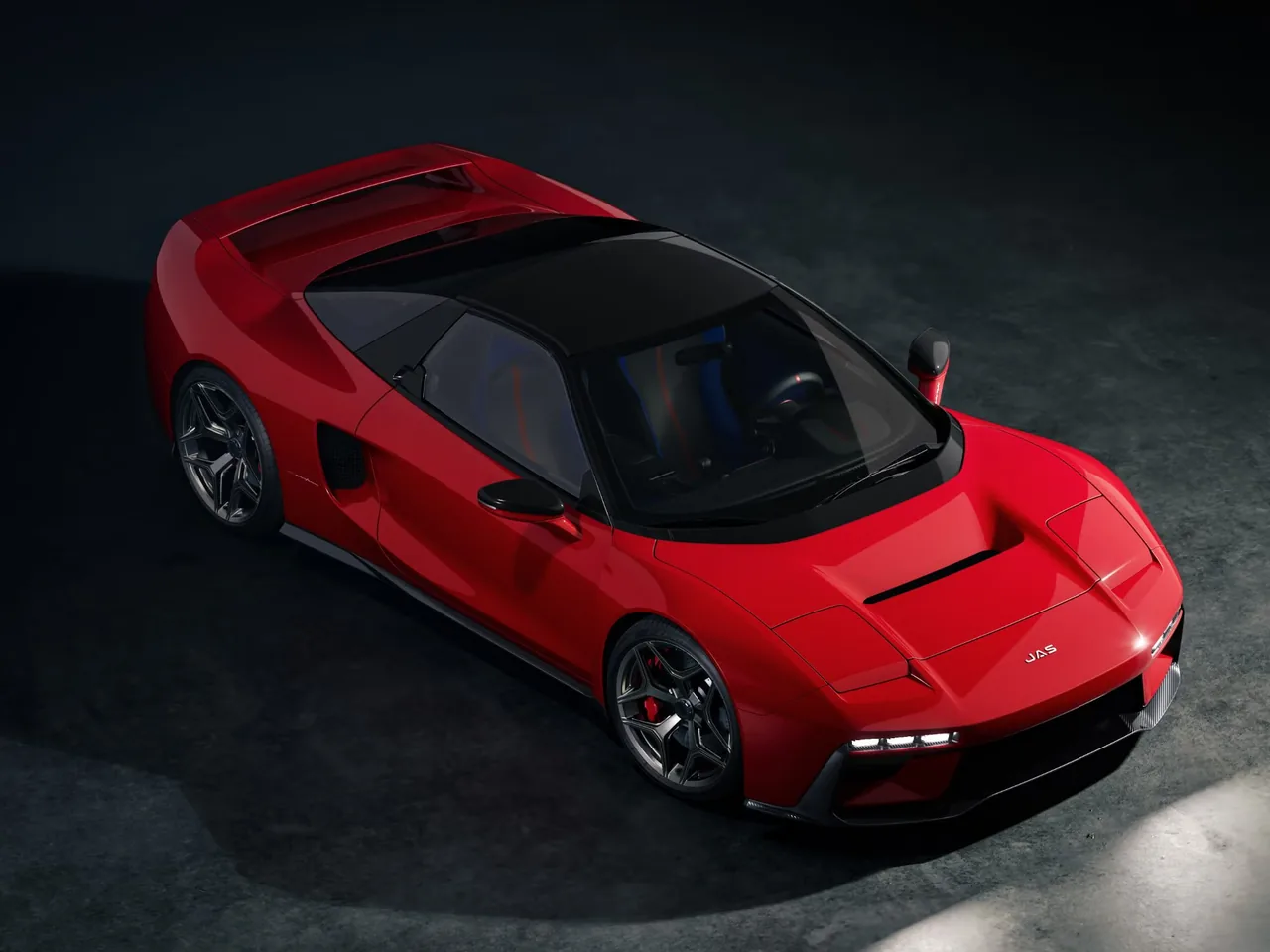 Red JAS Tensei from above with black roof, bonnet vent and blue-and-red seats visible through the windscreen