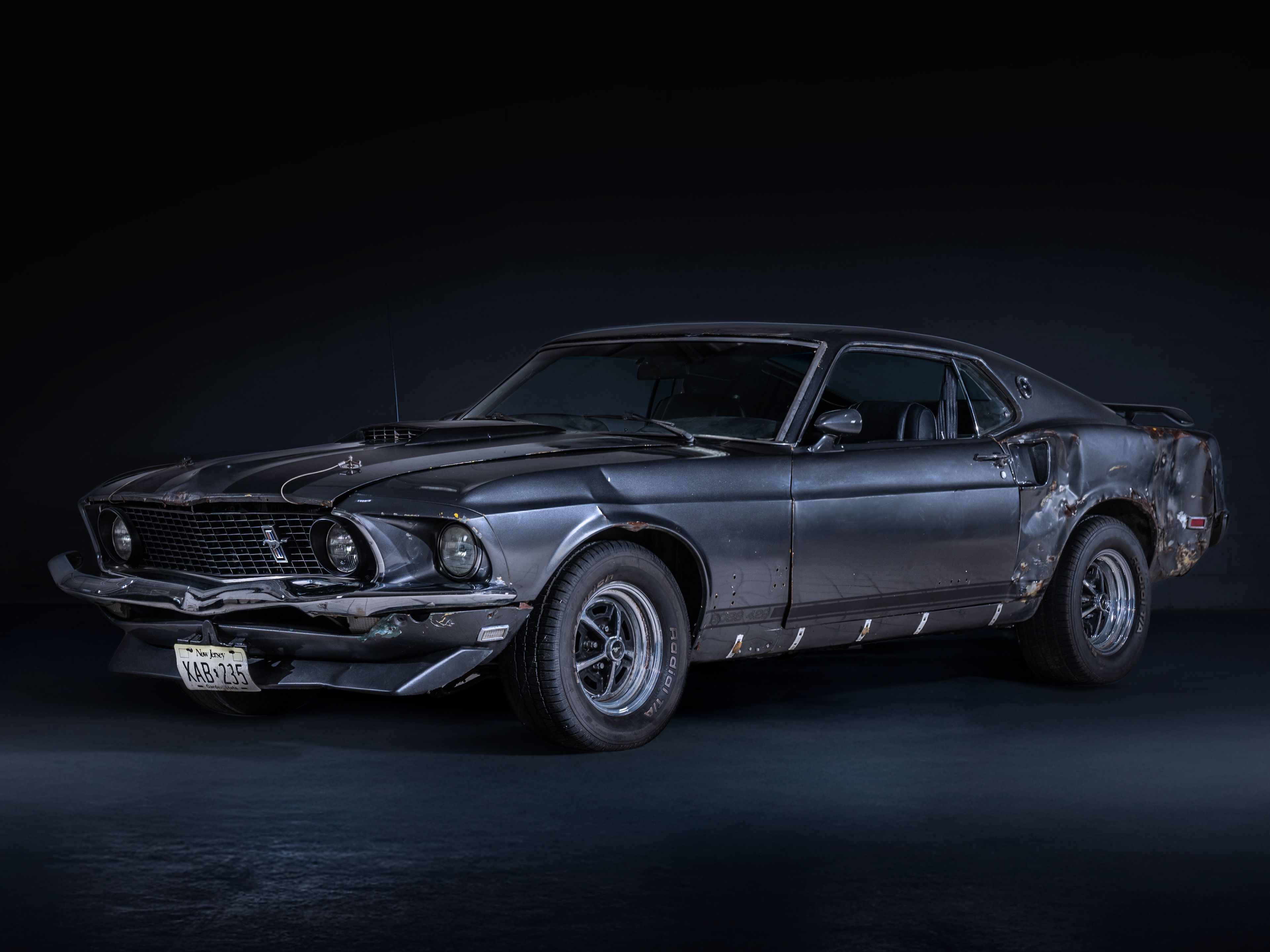 Screen-used 1969 Ford Mustang Mach 1 photographed from the front three-quarter angle