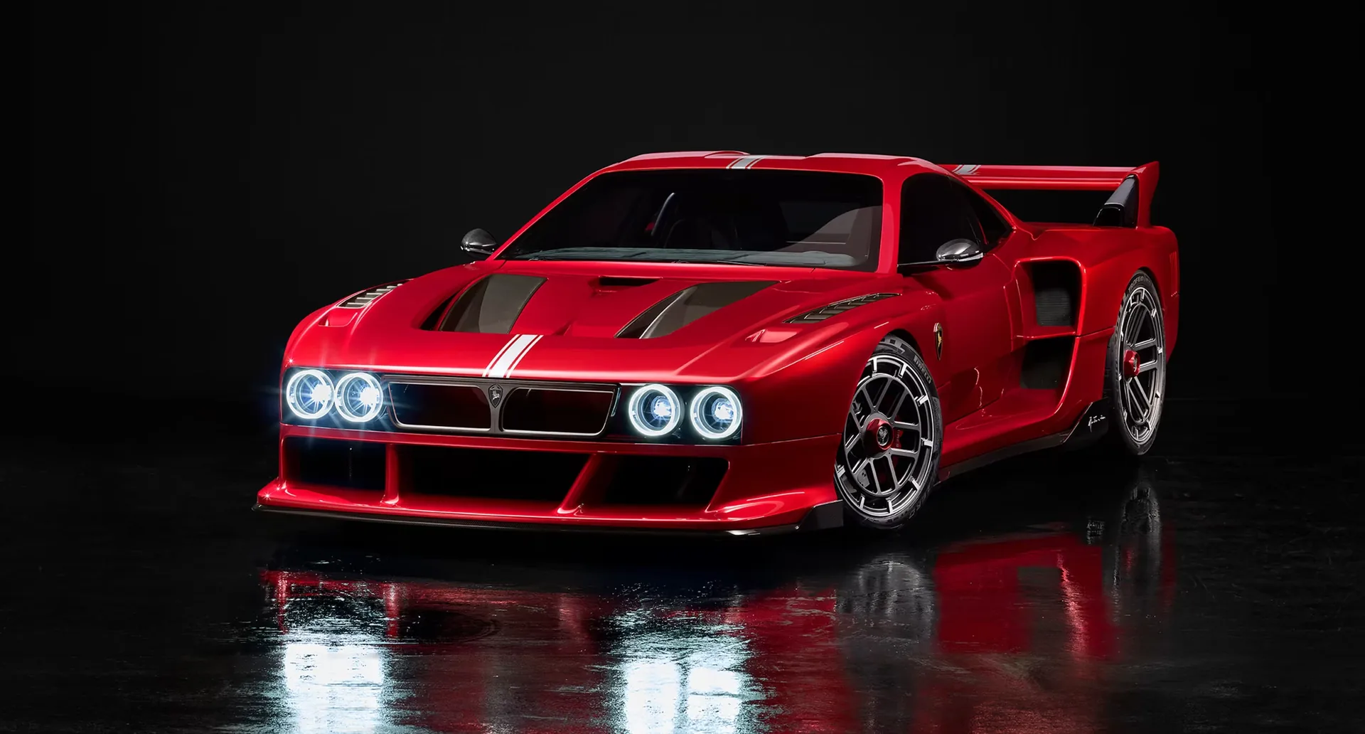 Red Kimera K-39 Stradale hypercar, front three-quarter studio view with quad round headlights