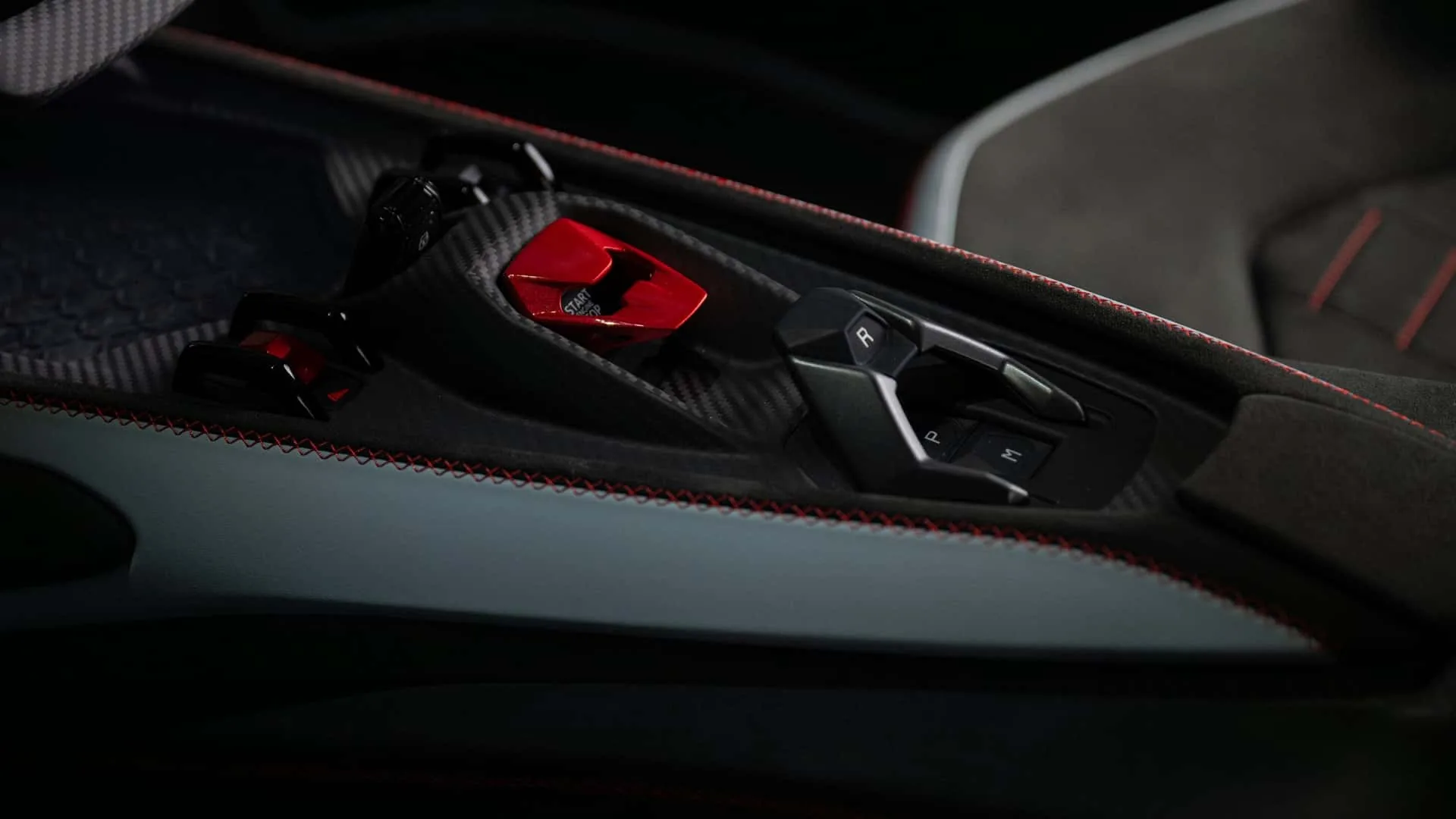 Lamborghini Revuelto SV center console showing machined gear selector, red START button and R P M drive buttons
