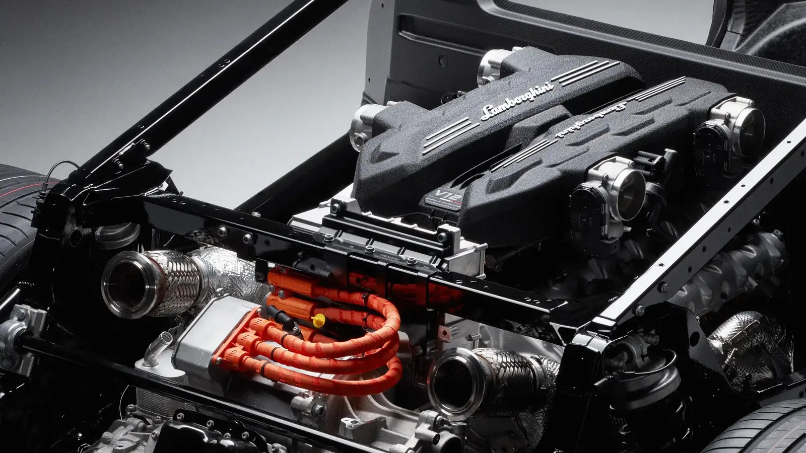 Lamborghini Revuelto side profile — mid-engine layout with plug-in hybrid V12 architecture