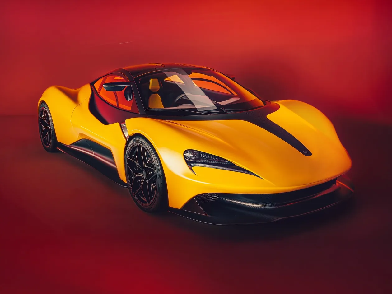 Lanzante 95-59 HDK front three-quarter rendering in yellow showing the roof-mounted air intake and vented bonnet