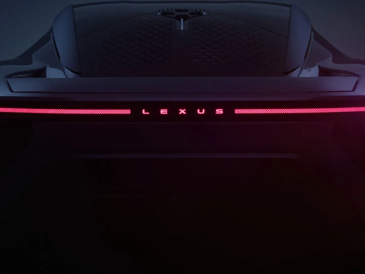 Lexus LFA Concept illuminated L-shaped rear light bar with third brake light referencing the original V10 LFA signature