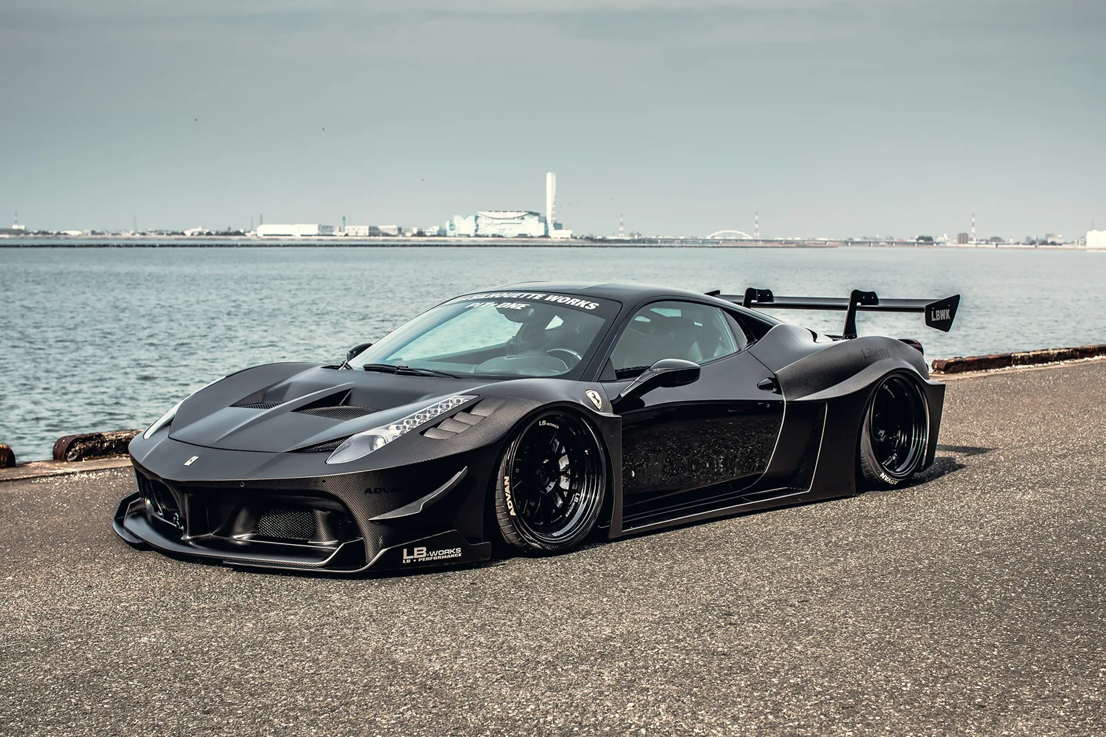 Liberty Walk LB-Silhouette Works GT 458 in black with full GT-car body, wide fenders and swan-neck rear wing