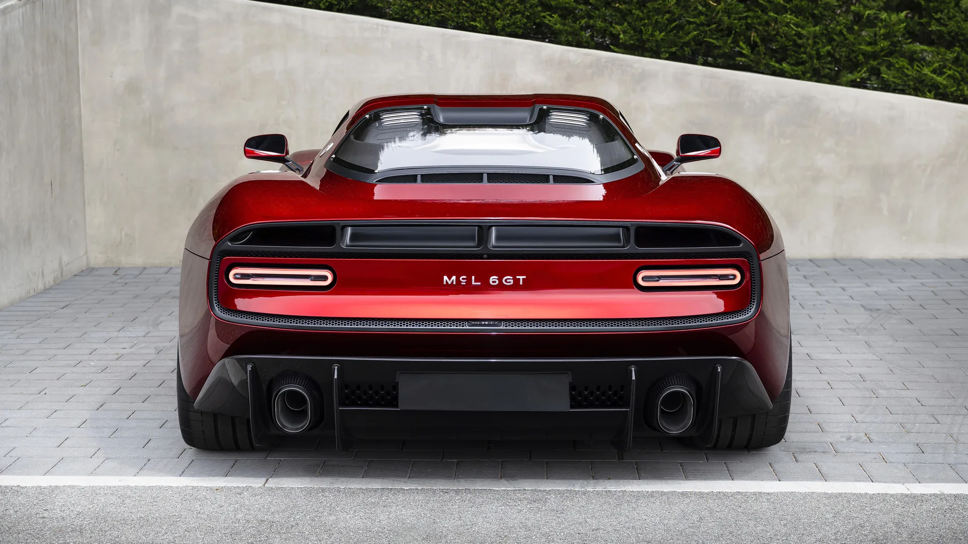 McLaren McL 6GT concept front three-quarter view revealed at Monterey Car Week 2026, first manual McLaren since the F1
