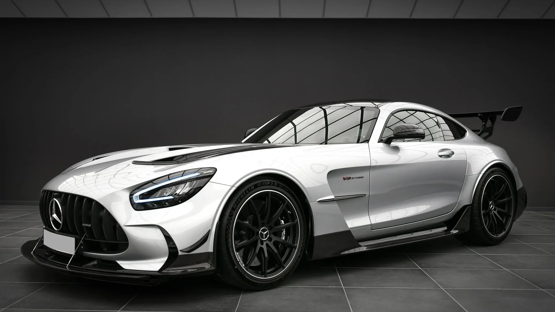 Silver Mercedes-AMG GT Black Series, front three-quarter in the Batman Garage studio