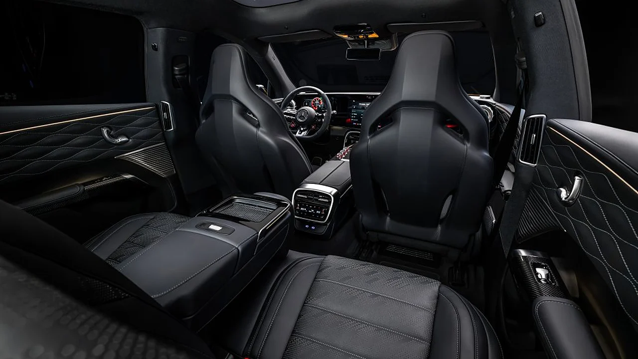 Mercedes-AMG GT SUV interior seen from the rear seats, with AMG Performance seats, quilted door panels and a panoramic roof